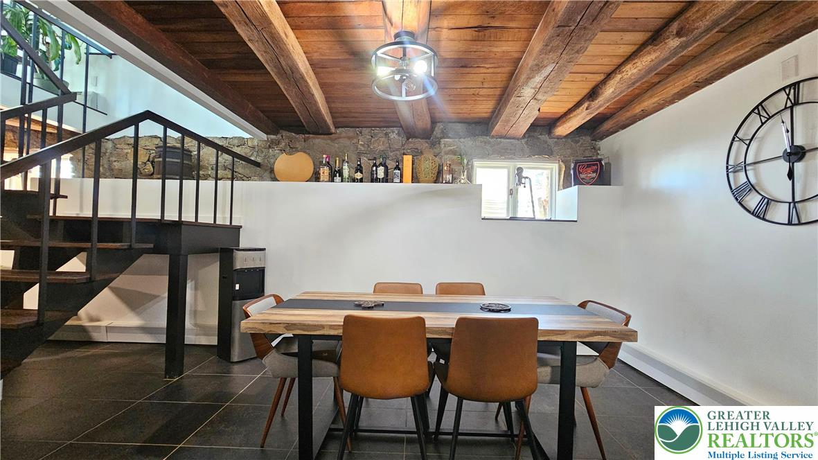 2239 Wassergass Road Hellertown, PA 18055 - Photo 19 of 42 a view of a dining room with furniture and a chandelier