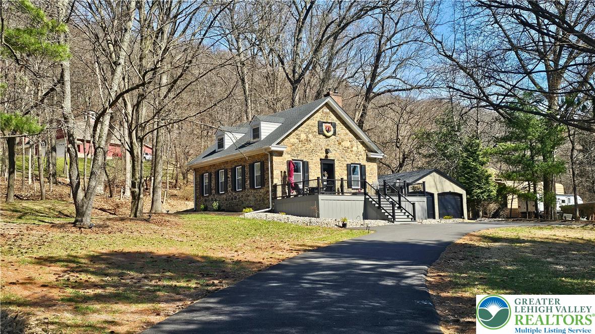 2239 Wassergass Road Hellertown, PA 18055 - Photo 2 of 42 a front view of a house with a yard