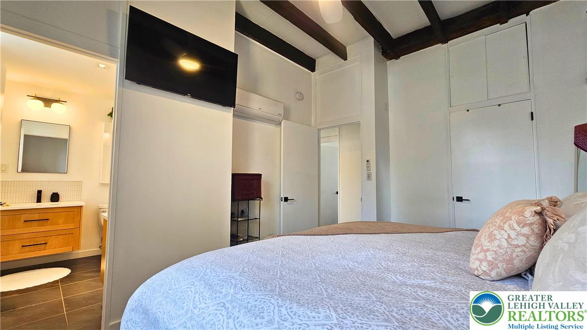 2239 Wassergass Road Hellertown, PA 18055 - Photo 24 of 42 a bedroom with a bed and a cabinets