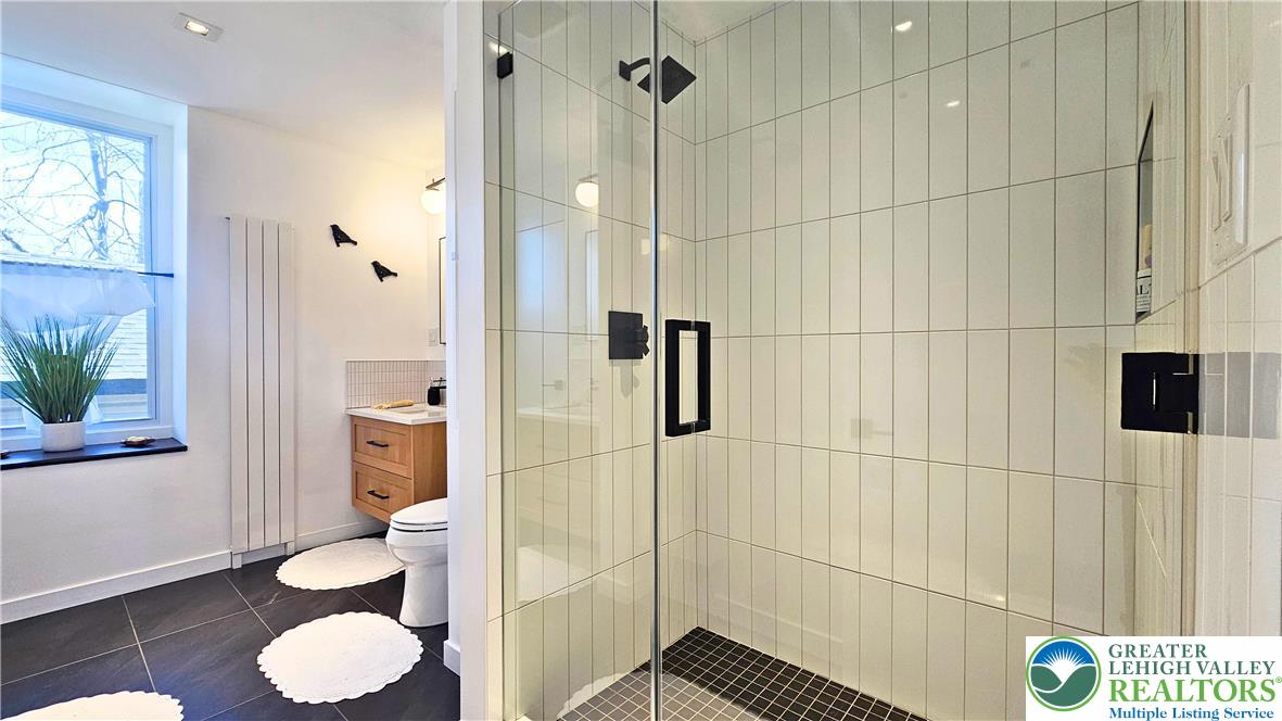 2239 Wassergass Road Hellertown, PA 18055 - Photo 26 of 42 a bathroom with a toilet and a shower