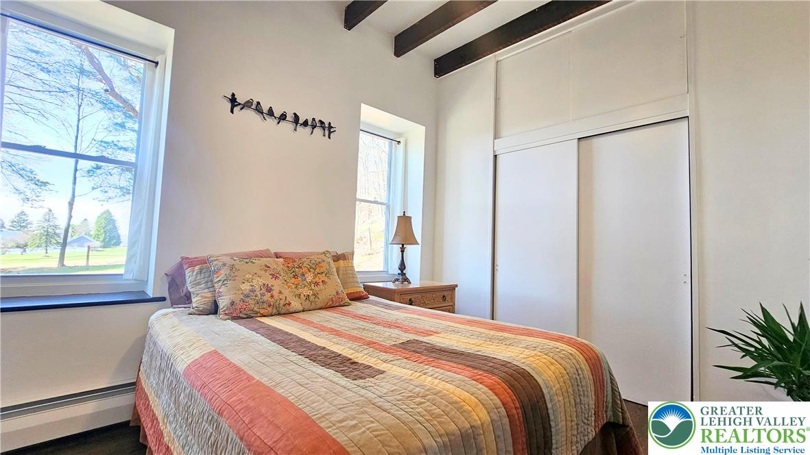 2239 Wassergass Road Hellertown, PA 18055 - Photo 27 of 42 a bedroom with a bed and a window