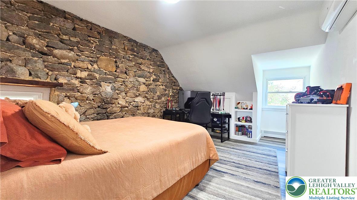 2239 Wassergass Road Hellertown, PA 18055 - Photo 33 of 42 a bedroom with a bed and a dresser