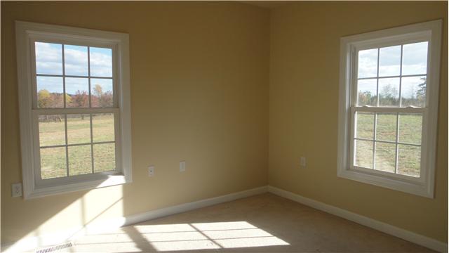 708 Barrett Road McMinnville, TN 37110 - Photo 9 of 20 Quietly tucked in a corner, Bedroom #3 enjoys a great view from the double windows.