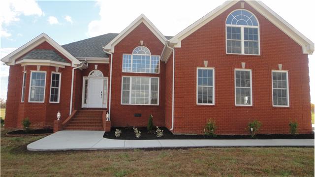 708 Barrett Road McMinnville, TN 37110 - Photo 14 of 20 Custom built brick (3 bedroom/2 bath) home with 2 car garage has new landscaping.