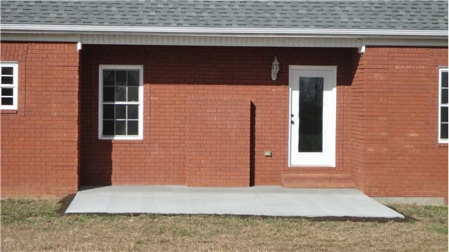 708 Barrett Road McMinnville, TN 37110 - Photo 17 of 20 Wander out the door to the back patio on those warm evenings to savor a bit of fresh air.