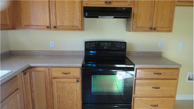 708 Barrett Road McMinnville, TN 37110 - Photo 6 of 20 Boasting a NEW stove and large tile floor, the user-friendly kitchen makes meals a cinch.