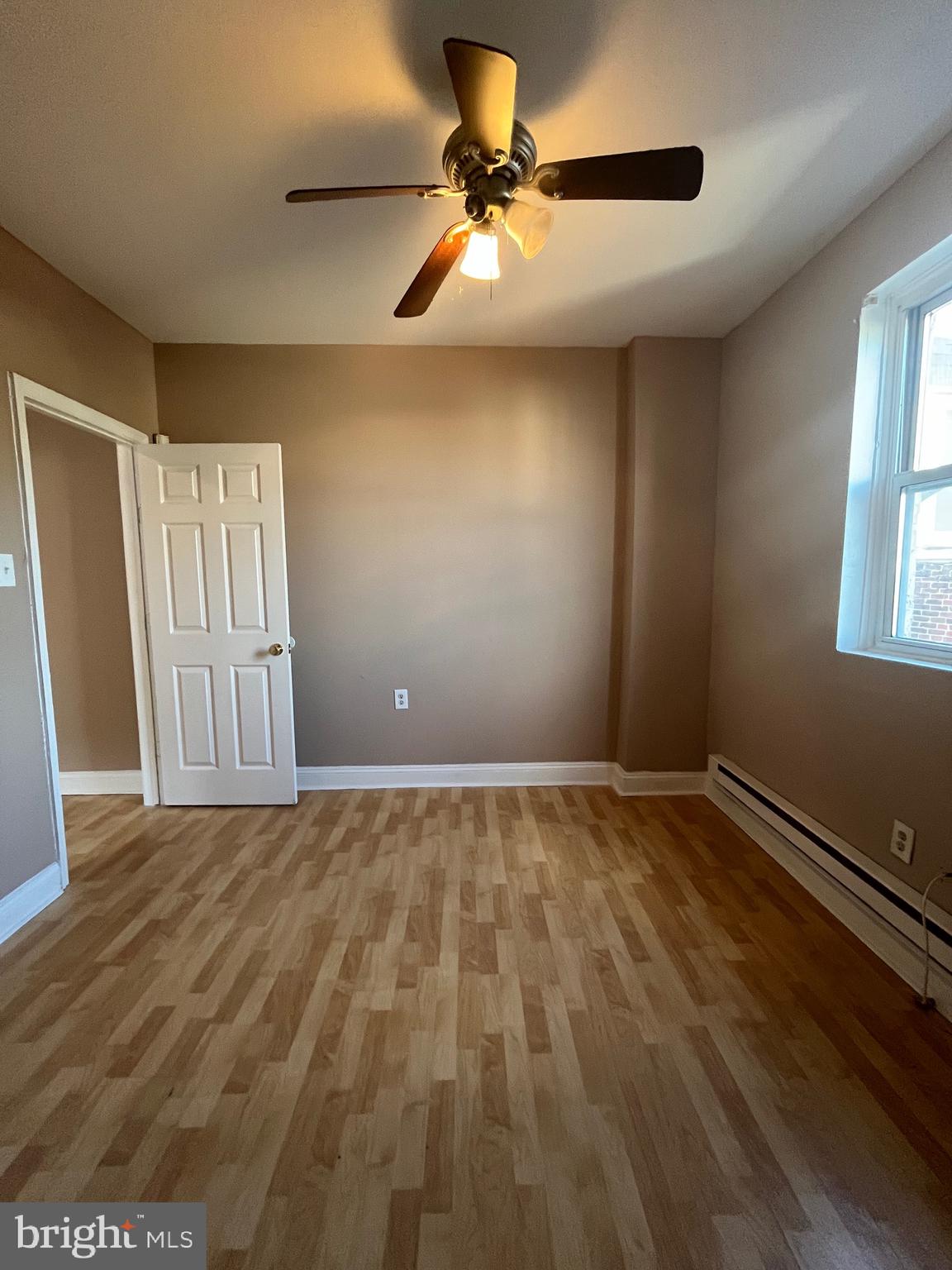 207 South 60th Street, Unit 3 Philadelphia, PA 19139 - Photo 13 of 14 a view of an empty room with a window