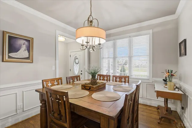 a bathroom with a sink mirror and toilet