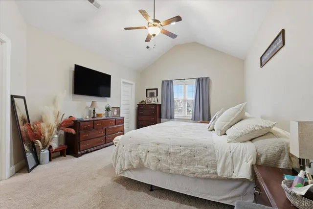 a bed room with a bed and a couch