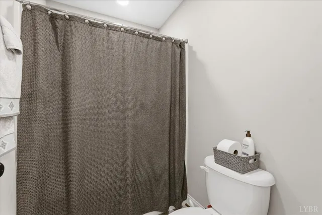 a bedroom with a bed and cabinets