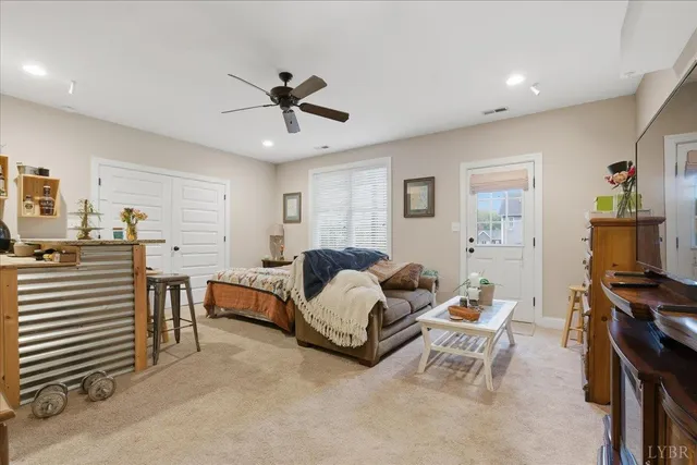 a bedroom with furniture and a bed