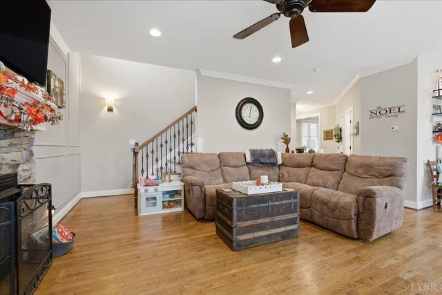 a kitchen with stainless steel appliances kitchen island granite countertop a table and chairs in it