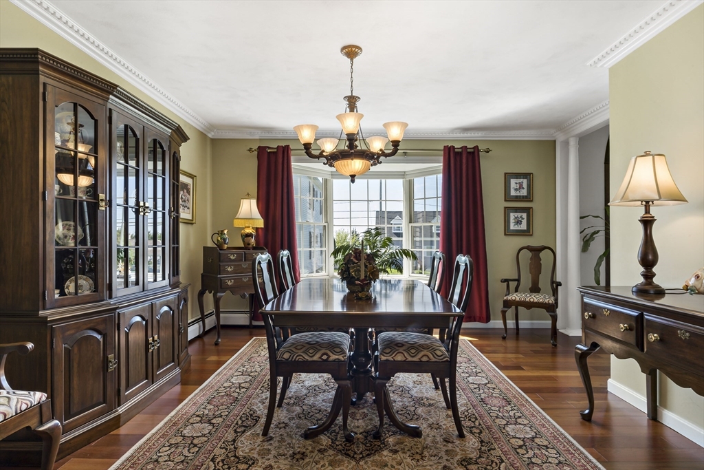 34 Howland Street Fall River, MA 02724 - Photo 15 of 42 a view of a dining room with furniture window and wooden floor