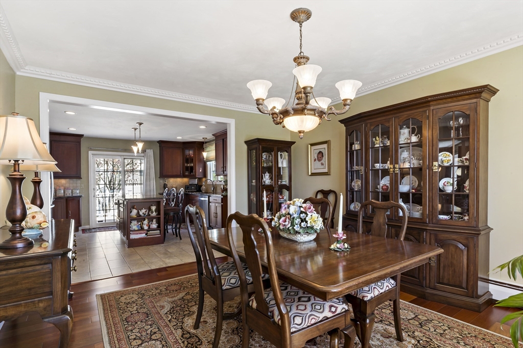 34 Howland Street Fall River, MA 02724 - Photo 16 of 42 a view of a dining room with furniture and chandelier