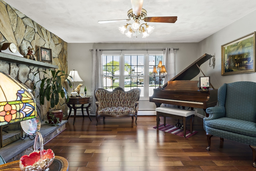 34 Howland Street Fall River, MA 02724 - Photo 20 of 42 a living room with furniture and a flat screen tv
