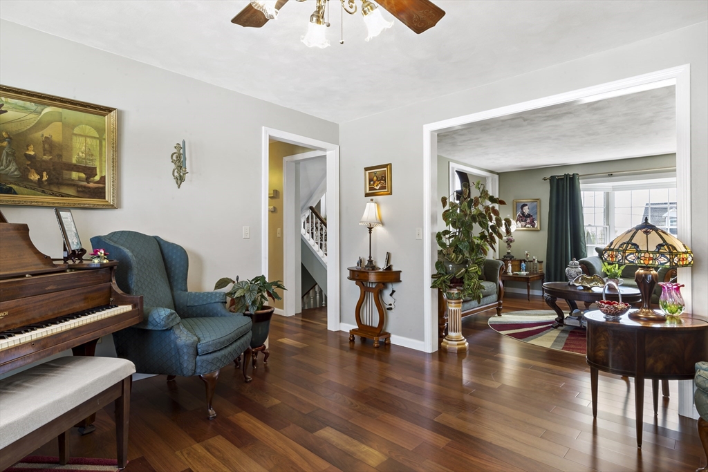 34 Howland Street Fall River, MA 02724 - Photo 21 of 42 a living room with furniture and a potted plant