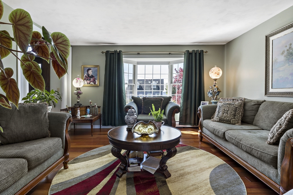 34 Howland Street Fall River, MA 02724 - Photo 22 of 42 a living room with furniture and a large window