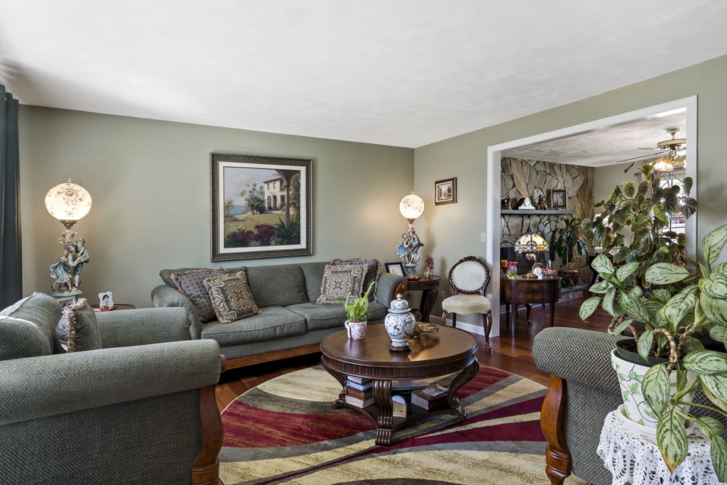 34 Howland Street Fall River, MA 02724 - Photo 23 of 42 a living room with furniture potted plant and a window