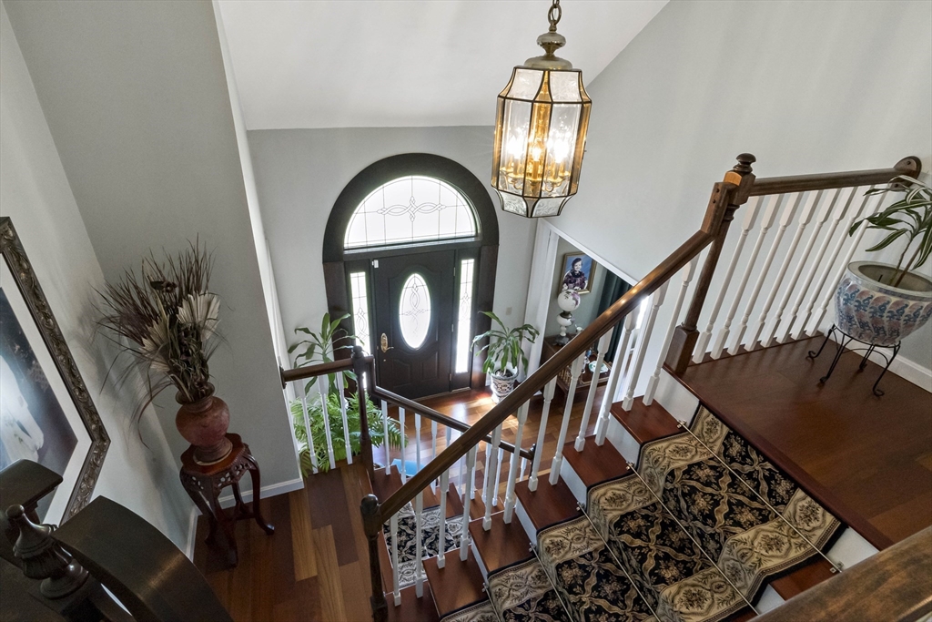34 Howland Street Fall River, MA 02724 - Photo 26 of 42 a view of an entryway with wooden floor