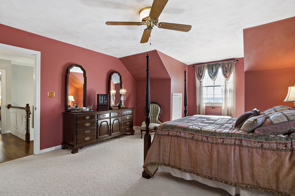 34 Howland Street Fall River, MA 02724 - Photo 28 of 42 a bedroom with a bed and a dresser