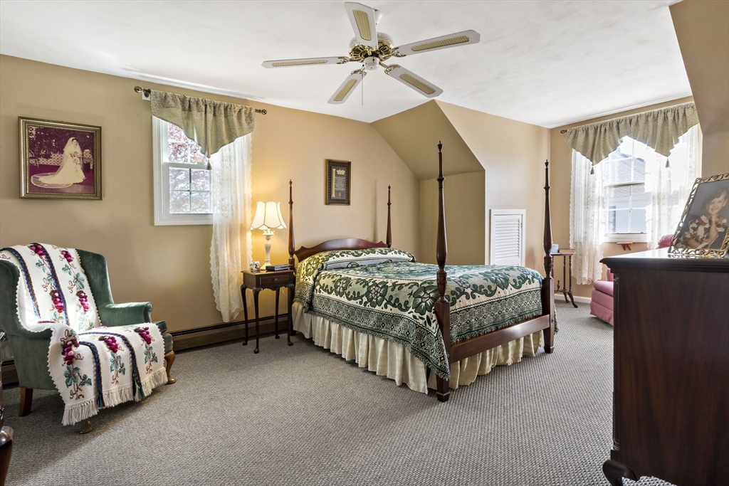 34 Howland Street Fall River, MA 02724 - Photo 30 of 42 a bedroom with a bed couch and window