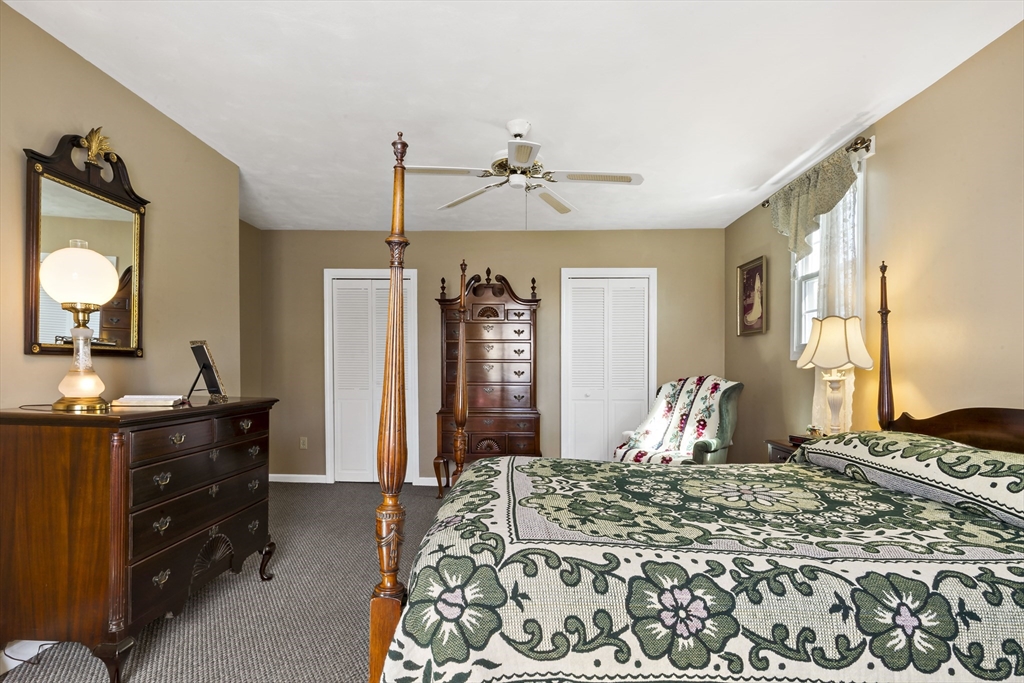 34 Howland Street Fall River, MA 02724 - Photo 31 of 42 a bedroom with a bed dresser and a window