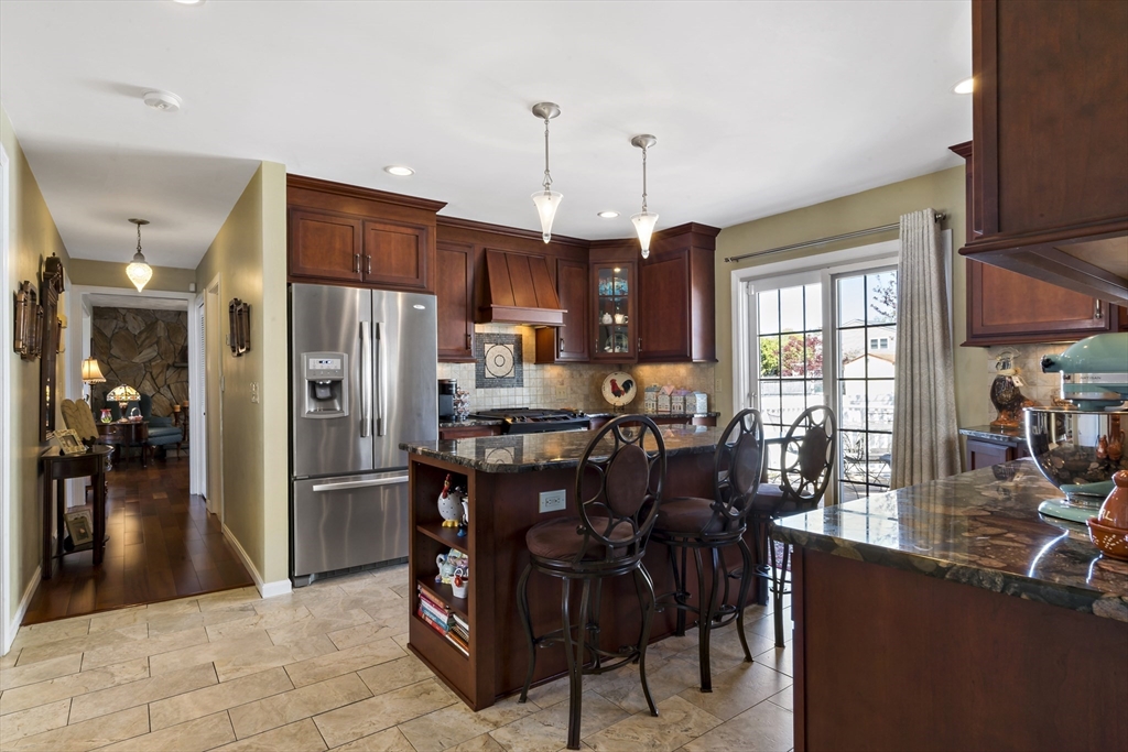 34 Howland Street Fall River, MA 02724 - Photo 10 of 42 a view of a dining room and livingroom view