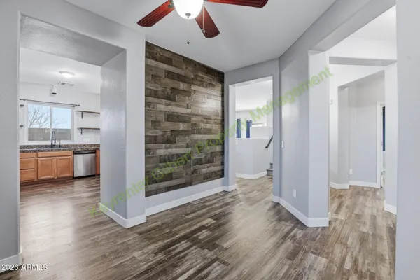 a kitchen with stainless steel appliances granite countertop a stove and a sink