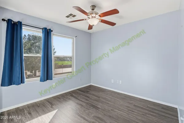 a view of an empty room and window