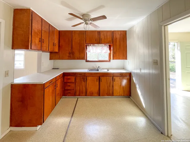 a view of a room with a hallway