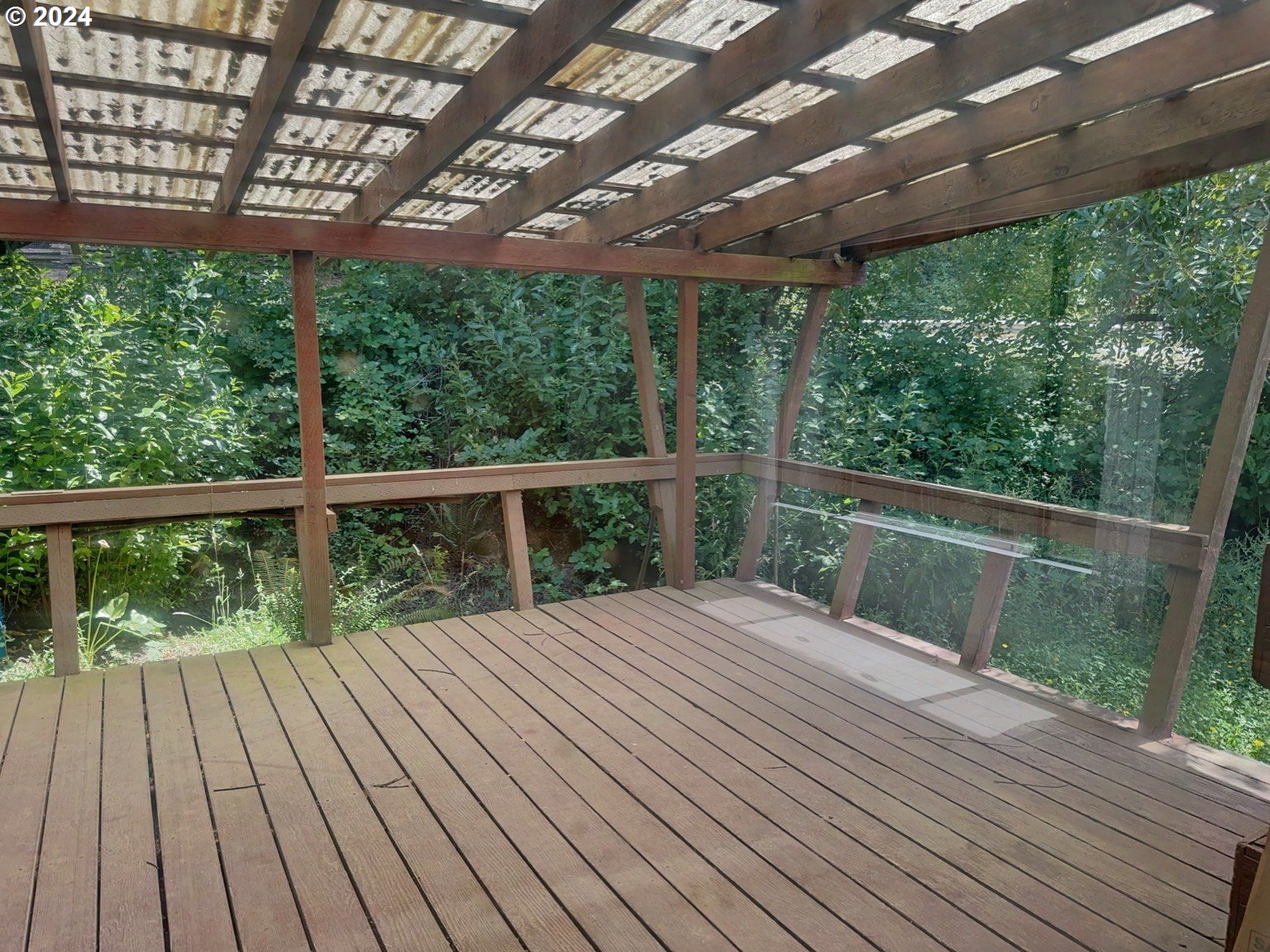 98368 Bridge Lane Myrtle Point, OR 97458 - Photo 25 of 37 a view of balcony with wooden floor