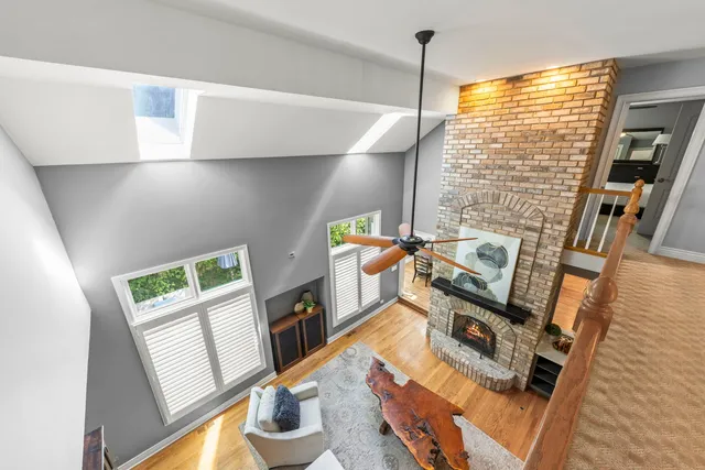 a view of living room with furniture and a window