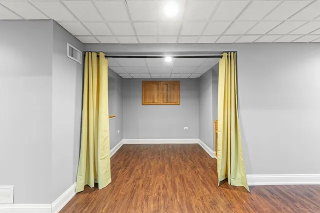 a view of hallway with natural light