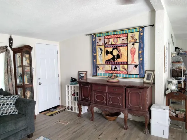 a view of a chairs and table in a room