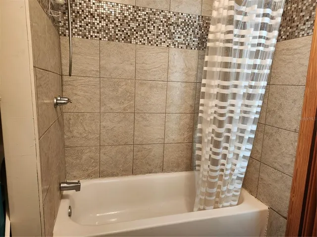 a bathroom with a bathtub