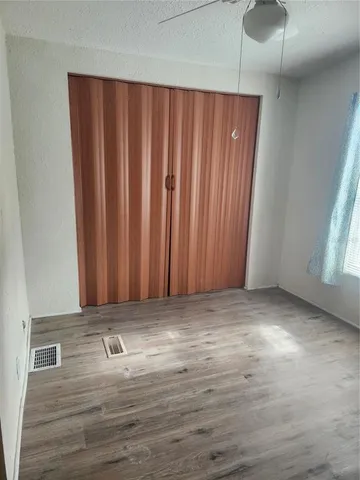 a view of wooden floor and staircase