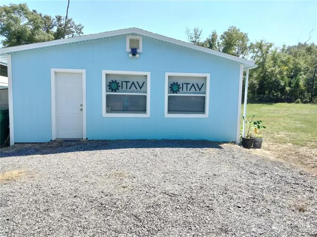 a front view of house with yard