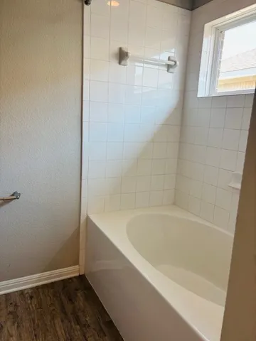 a bathroom with a sink double vanity and a mirror