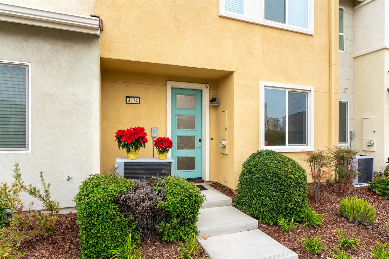 4174 Sally Ride Way Sacramento, CA 95834 - Photo 2 of 38 a front view of a house with a yard