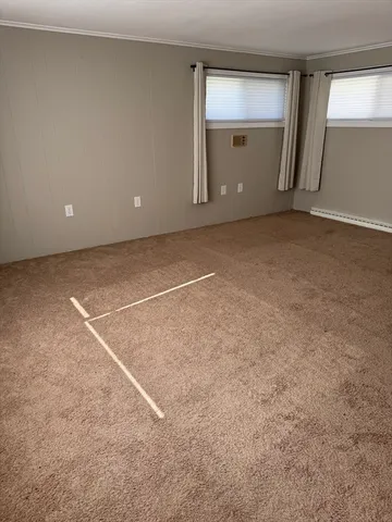 an empty room with window