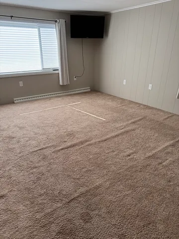 a view of empty room with a window