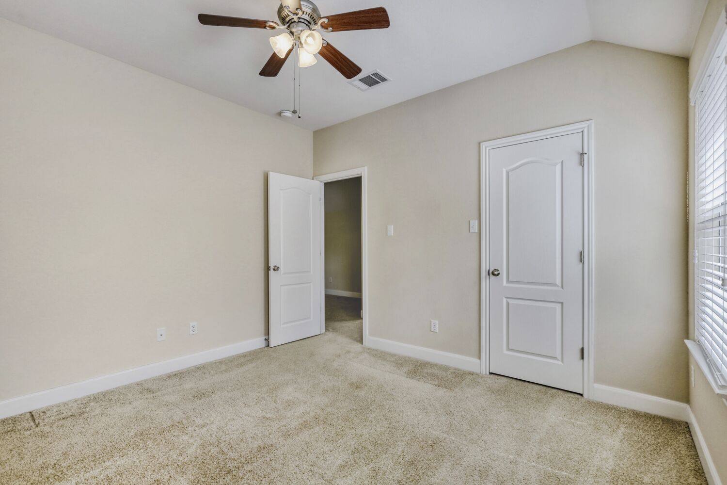 24 Stone Terrace Drive Austin, TX 78734 - Photo 23 of 32 a view of an empty room and chandelier fan