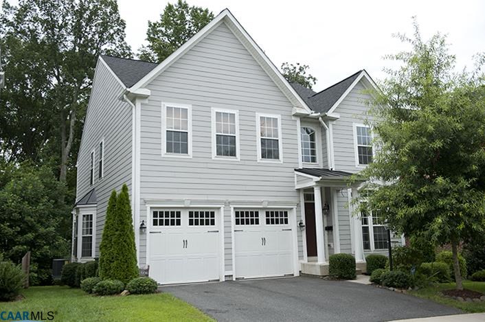 702 Rainier Road Charlottesville, VA 22903 - Photo 1 of 27 a view of a white house next to a yard