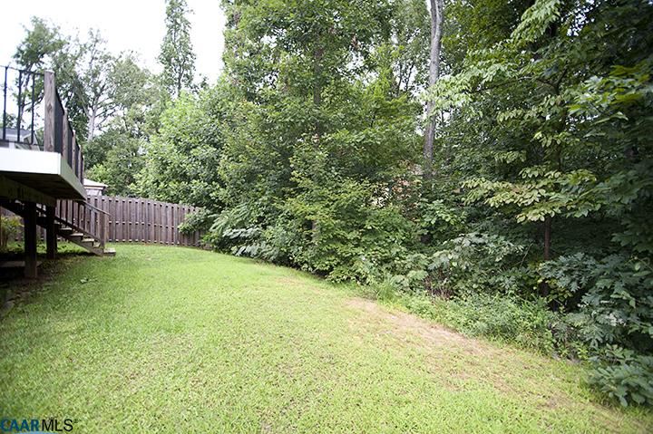 702 Rainier Road Charlottesville, VA 22903 - Photo 11 of 27 a view of a backyard with a garden and entertaining space