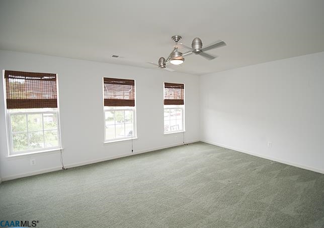 702 Rainier Road Charlottesville, VA 22903 - Photo 23 of 27 a view of room with window and ceiling fan