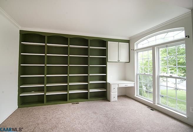 702 Rainier Road Charlottesville, VA 22903 - Photo 3 of 27 a view of an empty room with a window