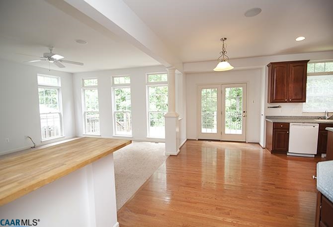 702 Rainier Road Charlottesville, VA 22903 - Photo 7 of 27 a view of an empty room with window and wooden floor