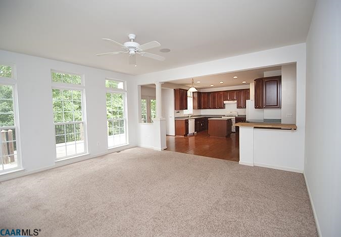 702 Rainier Road Charlottesville, VA 22903 - Photo 8 of 27 a view of kitchen with refrigerator and window