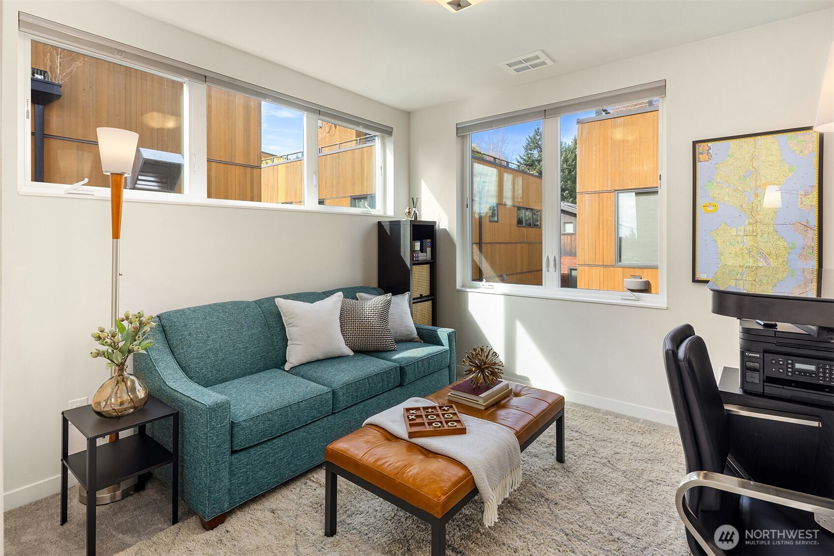 3300 Northeast 65th Street, Unit 211 Seattle, WA 98115 - Photo 11 of 15 a living room with furniture and a large window