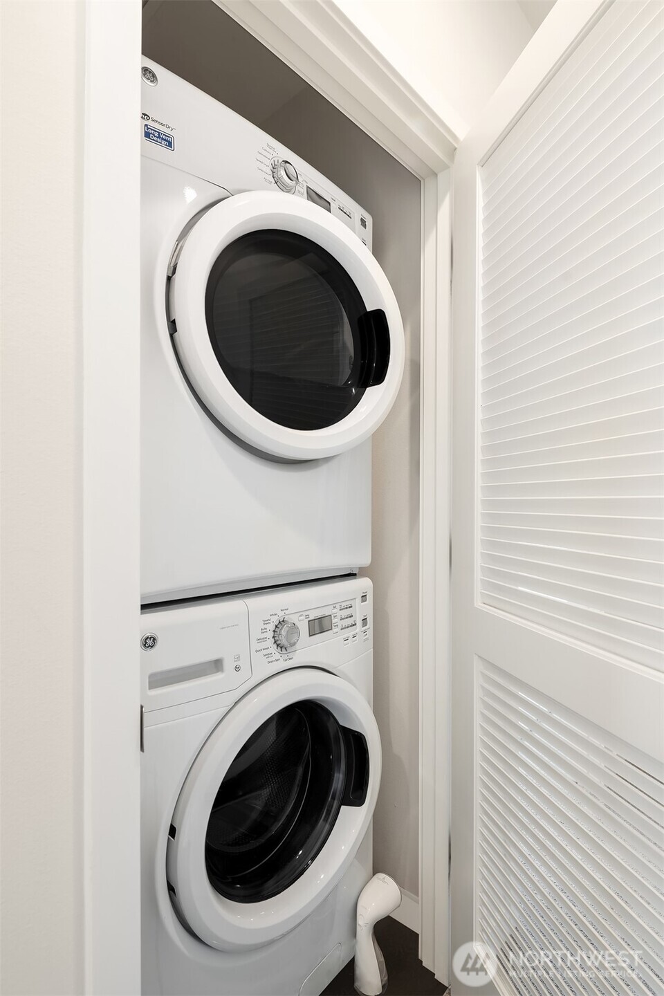 3300 Northeast 65th Street, Unit 211 Seattle, WA 98115 - Photo 13 of 15 a utility room with dryer and washer
